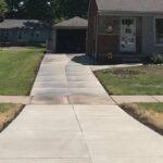house with driveway replacement